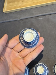 A collection of 32 pieces Chinese blue and white cups, saucers and covers with floral design, Qianlong