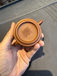 A collection of 20 Chinese Yixing stoneware teapots, 20th C.