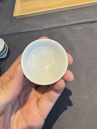 A collection of 32 pieces Chinese blue and white cups, saucers and covers with floral design, Qianlong