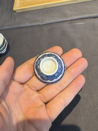 A collection of 32 pieces Chinese blue and white cups, saucers and covers with floral design, Qianlong