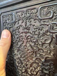 A Chinese zitan wood 'duo bao ge' cabinet of curiosities with carved floral design, 19th C.