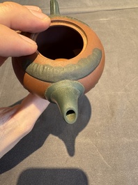 A collection of 20 Chinese Yixing stoneware teapots, 20th C.