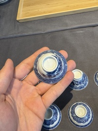 A collection of 32 pieces Chinese blue and white cups, saucers and covers with floral design, Qianlong