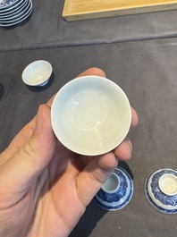 A collection of 32 pieces Chinese blue and white cups, saucers and covers with floral design, Qianlong