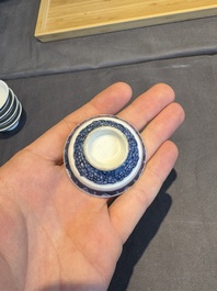 A collection of 32 pieces Chinese blue and white cups, saucers and covers with floral design, Qianlong