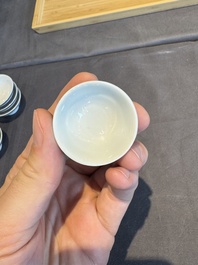 A collection of 32 pieces Chinese blue and white cups, saucers and covers with floral design, Qianlong
