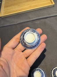 A collection of 32 pieces Chinese blue and white cups, saucers and covers with floral design, Qianlong