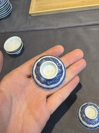 A collection of 32 pieces Chinese blue and white cups, saucers and covers with floral design, Qianlong