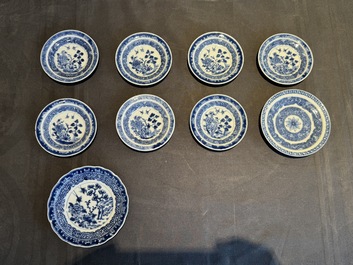 A collection of 32 pieces Chinese blue and white cups, saucers and covers with floral design, Qianlong