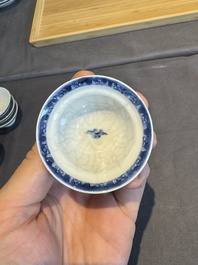 A collection of 32 pieces Chinese blue and white cups, saucers and covers with floral design, Qianlong