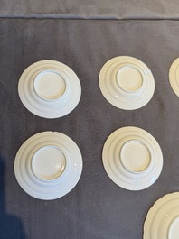 A collection of 32 pieces Chinese blue and white cups, saucers and covers with floral design, Qianlong