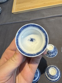 A collection of 32 pieces Chinese blue and white cups, saucers and covers with floral design, Qianlong