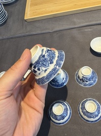 A collection of 32 pieces Chinese blue and white cups, saucers and covers with floral design, Qianlong