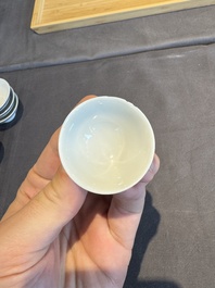 A collection of 32 pieces Chinese blue and white cups, saucers and covers with floral design, Qianlong