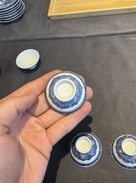A collection of 32 pieces Chinese blue and white cups, saucers and covers with floral design, Qianlong