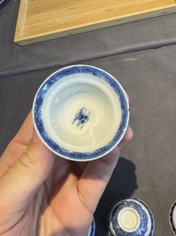 A collection of 32 pieces Chinese blue and white cups, saucers and covers with floral design, Qianlong