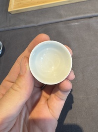 A collection of 32 pieces Chinese blue and white cups, saucers and covers with floral design, Qianlong