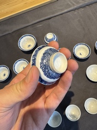 A collection of 32 pieces Chinese blue and white cups, saucers and covers with floral design, Qianlong