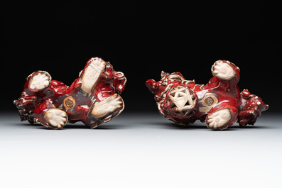 A pair of Chinese lime-green-glazed Buddhist lions and a pair of flamb&eacute;-glazed Shiwan Buddhist lions, 19/20th C.