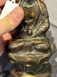 A Chinese bronze seated Guanyin on a lotus throne, probably Liao