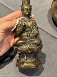 A Chinese bronze seated Guanyin on a lotus throne, probably Liao