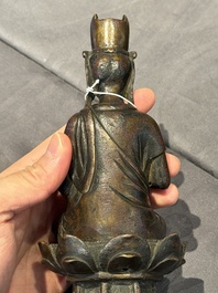 A Chinese bronze seated Guanyin on a lotus throne, probably Liao