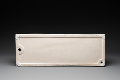A pair of large white-glazed shop display models of sphinxes, Petrus Regout, Maastricht, 20th C.