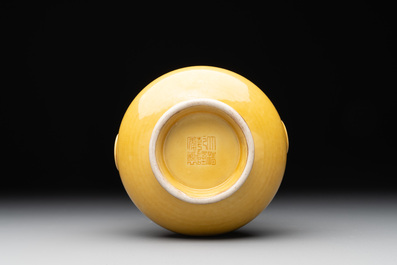 A Chinese yellow-glazed 'hu' vase, Qianlong mark, 19/20th C.