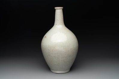 A pale celadon-glazed vase, a jar and a ewer, Asia, 19th C and later