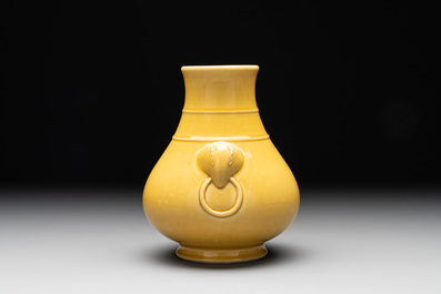 A Chinese yellow-glazed 'hu' vase, Qianlong mark, 19/20th C.