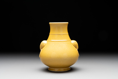 A Chinese yellow-glazed 'hu' vase, Qianlong mark, 19/20th C.