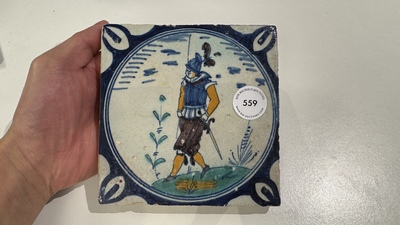 A polychrome Dutch Delft maiolica 'medallion' 'soldier' tile, late 16th C.