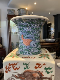 A pair of Chinese famille verte 'dragon' vases and wooden stands, Chenghua mark, 19th C.