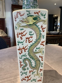 A pair of Chinese famille verte 'dragon' vases and wooden stands, Chenghua mark, 19th C.