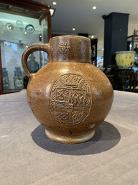 A globular stoneware jug with three coat of arms medallions, Germany, 16th C.