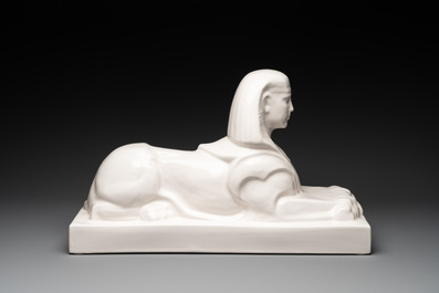 A pair of large white-glazed shop display models of sphinxes, Petrus Regout, Maastricht, 20th C.