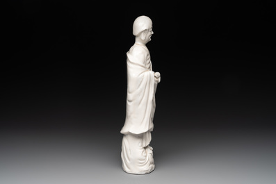 Two Chinese Dehua blanc de Chine cups and a figure of Liuhai, 18/19th C.