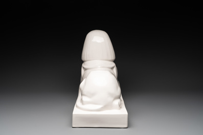 A pair of large white-glazed shop display models of sphinxes, Petrus Regout, Maastricht, 20th C.