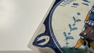 A polychrome Dutch Delft maiolica 'medallion' 'soldier' tile, late 16th C.