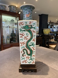 A pair of Chinese famille verte 'dragon' vases and wooden stands, Chenghua mark, 19th C.