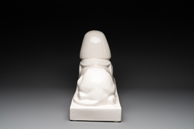 A pair of large white-glazed shop display models of sphinxes, Petrus Regout, Maastricht, 20th C.