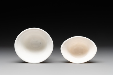 Two Chinese Dehua blanc de Chine cups and a figure of Liuhai, 18/19th C.
