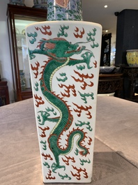 A pair of Chinese famille verte 'dragon' vases and wooden stands, Chenghua mark, 19th C.