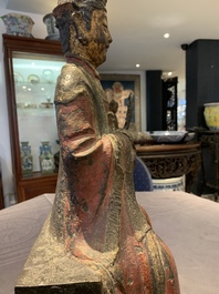 A large Chinese polychrome-lacquered and gilt bronze Daoist immortal, 17th C.