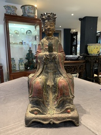 A large Chinese polychrome-lacquered and gilt bronze Daoist immortal, 17th C.