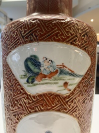 A Chinese famille rose coral-red-ground vase and a famille verte vase, 19th C.