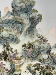 A large Chinese carved wooden table screen with a fine famille rose 'landscape' plaque, 19th C.