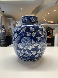 Two Chinese blue and white 'peonies' and 'peonies and antiquities' jars and covers, 19th C.