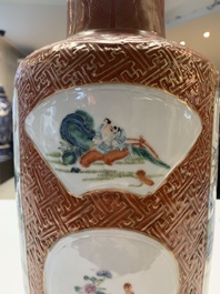 A Chinese famille rose coral-red-ground vase and a famille verte vase, 19th C.