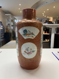 A Chinese famille rose coral-red-ground vase and a famille verte vase, 19th C.